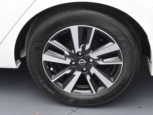 2025 Aspen White Tricoat Nissan Versa 1.6 SV FWD Sedan