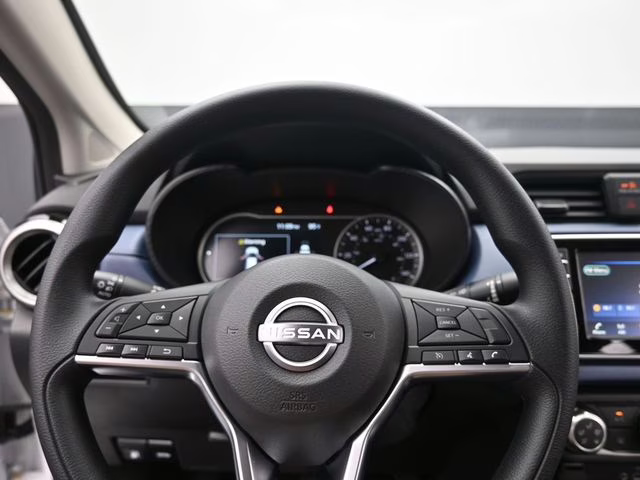 2025 Aspen White Tricoat Nissan Versa 1.6 SV FWD Sedan