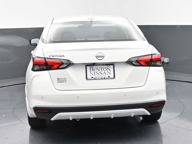 2025 Aspen White Tricoat Nissan Versa 1.6 SV FWD Sedan