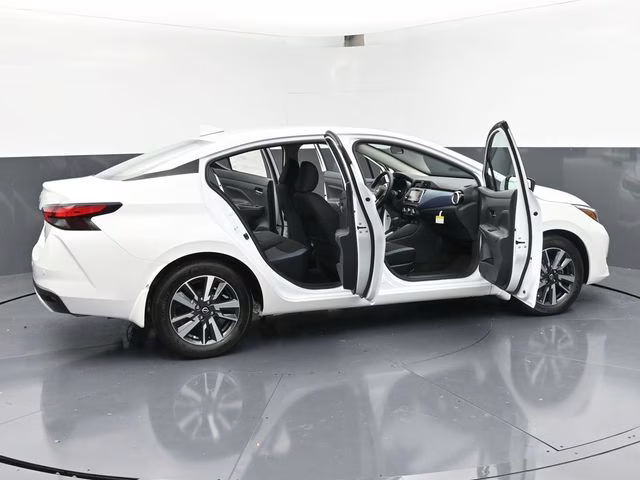 2025 Aspen White Tricoat Nissan Versa 1.6 SV FWD Sedan