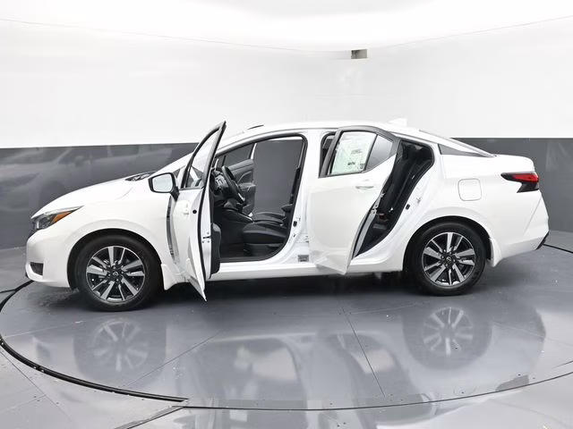 2025 Aspen White Tricoat Nissan Versa 1.6 SV FWD Sedan