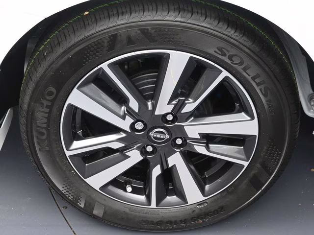 2025 Aspen White Tricoat Nissan Versa 1.6 SV FWD Sedan