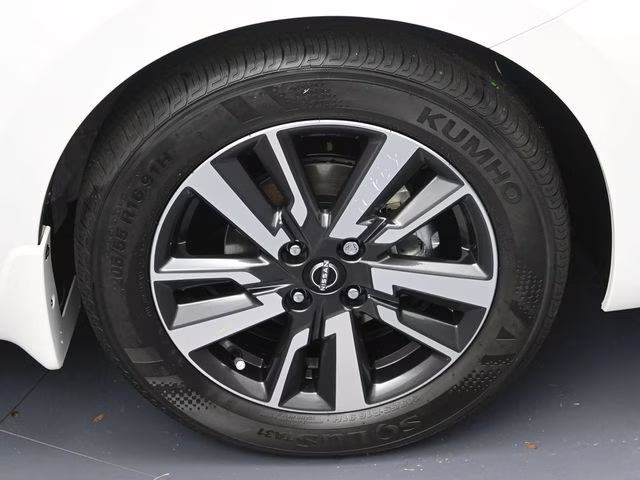 2025 Aspen White Tricoat Nissan Versa 1.6 SV FWD Sedan