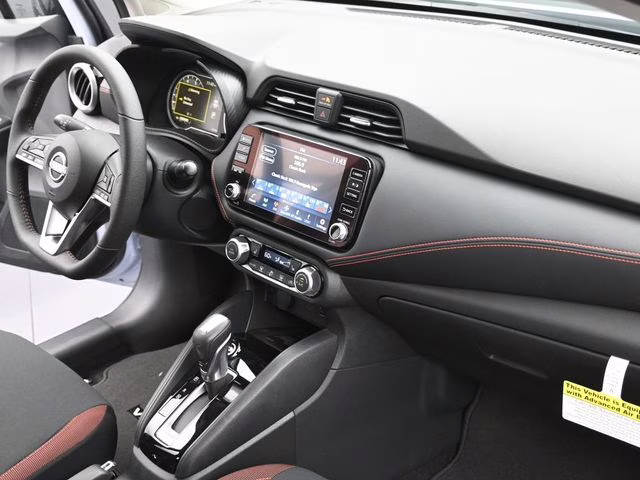 2025 Gray Sky Pearl Nissan Versa 1.6 SR FWD Sedan