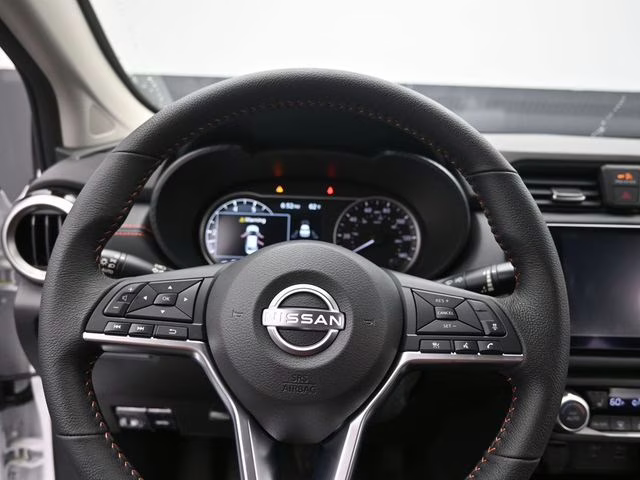 2025 Aspen White Tricoat Nissan Versa 1.6 SR FWD Sedan