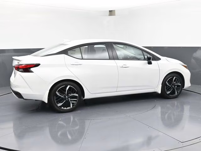 2025 Aspen White Tricoat Nissan Versa 1.6 SR FWD Sedan