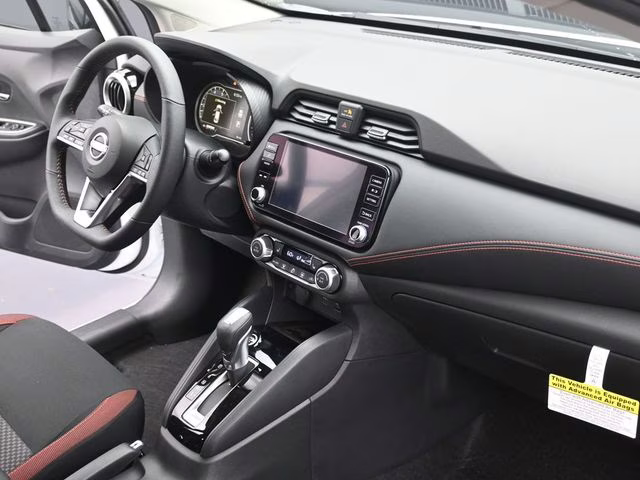 2025 Aspen White Tricoat Nissan Versa 1.6 SR FWD Sedan