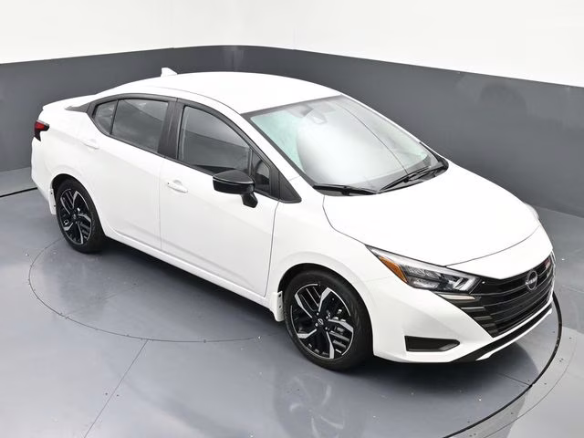 2025 Aspen White Tricoat Nissan Versa 1.6 SR FWD Sedan