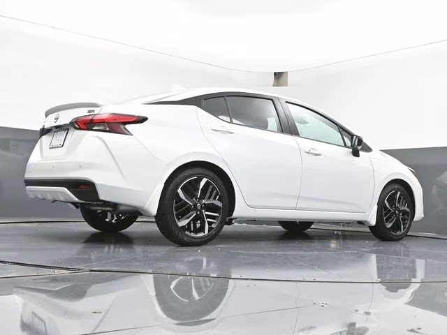 2025 Aspen White Tricoat Nissan Versa 1.6 SR FWD Sedan