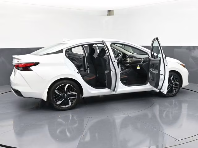 2025 Aspen White Tricoat Nissan Versa 1.6 SR FWD Sedan