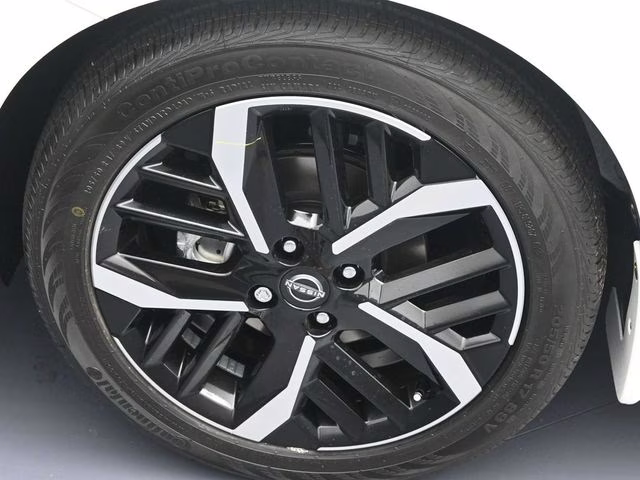 2025 Aspen White Tricoat Nissan Versa 1.6 SR FWD Sedan