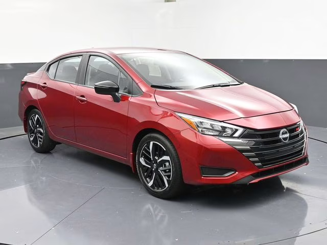 2025 Scarlet Ember Tintcoat Nissan Versa 1.6 SR FWD Sedan