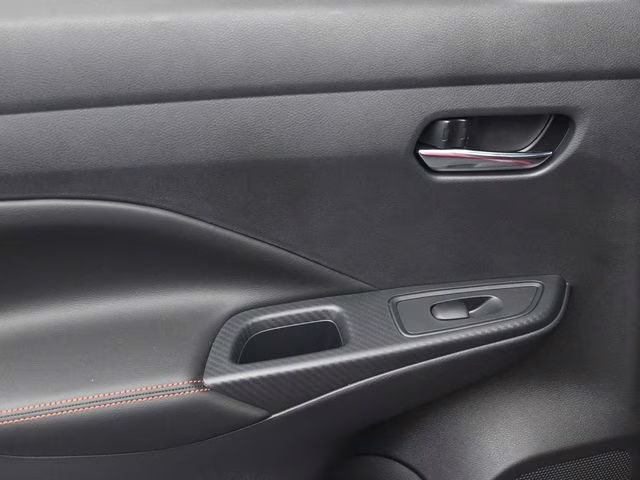 2025 Scarlet Ember Tintcoat Nissan Versa 1.6 SR FWD Sedan