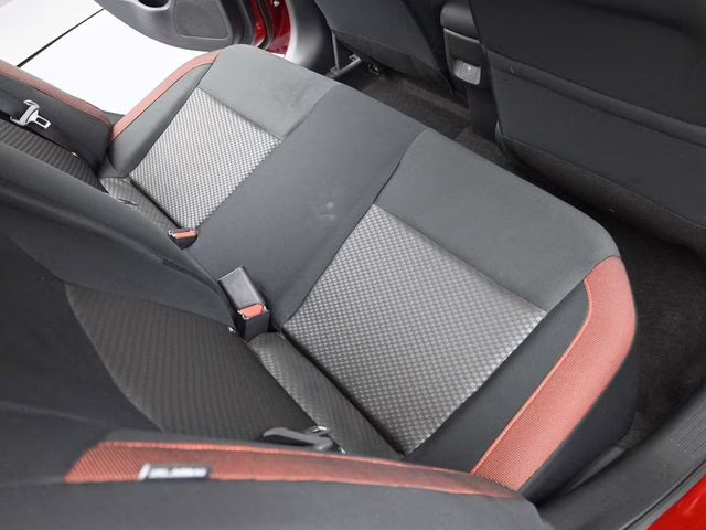 2025 Scarlet Ember Tintcoat Nissan Versa 1.6 SR FWD Sedan