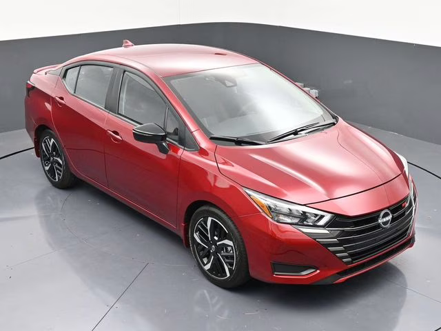 2025 Scarlet Ember Tintcoat Nissan Versa 1.6 SR FWD Sedan