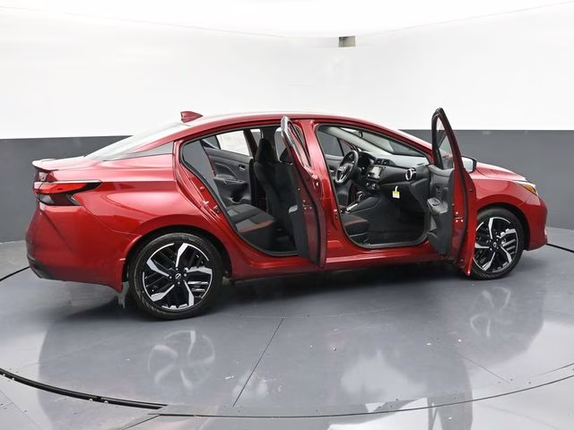 2025 Scarlet Ember Tintcoat Nissan Versa 1.6 SR FWD Sedan