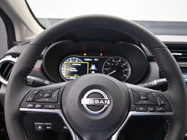 2025 Super Black Metallic Nissan Versa 1.6 SR FWD Sedan