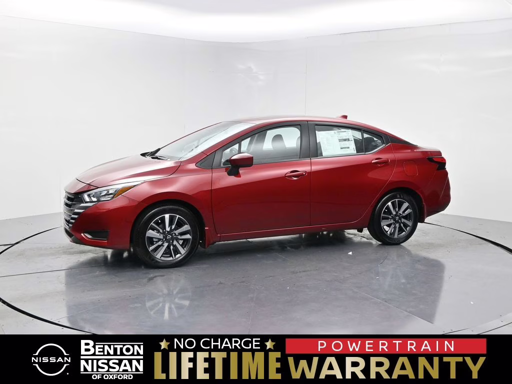 2025 Scarlet Ember Tintcoat Nissan Versa 1.6 SV FWD Sedan