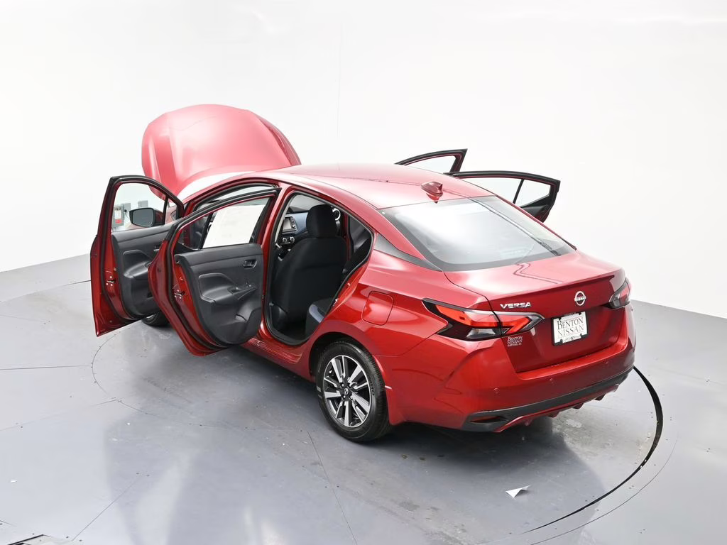 2025 Scarlet Ember Tintcoat Nissan Versa 1.6 SV FWD Sedan