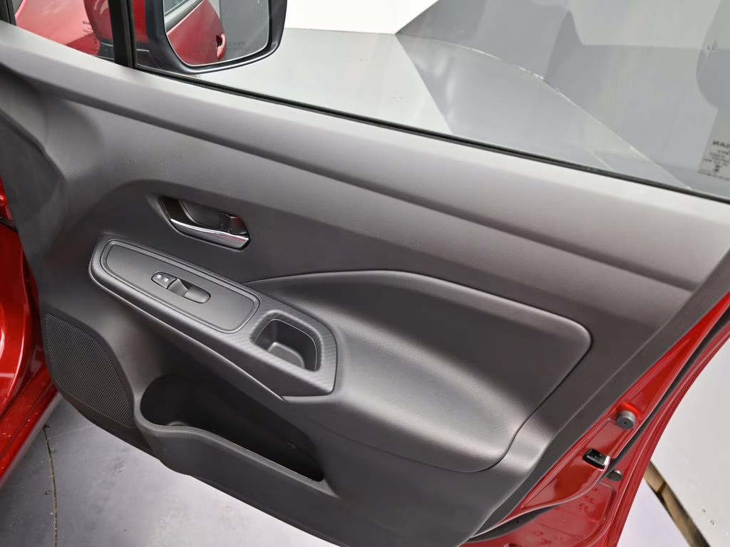 2025 Scarlet Ember Tintcoat Nissan Versa 1.6 SV FWD Sedan