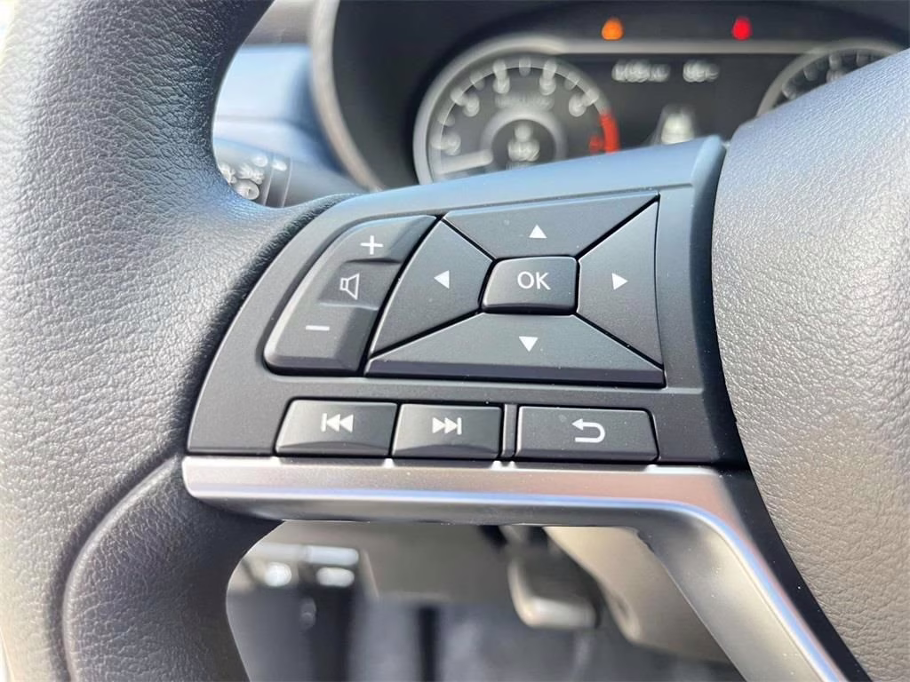 2025 Aspen White Tricoat Nissan Versa 1.6 SV FWD Sedan