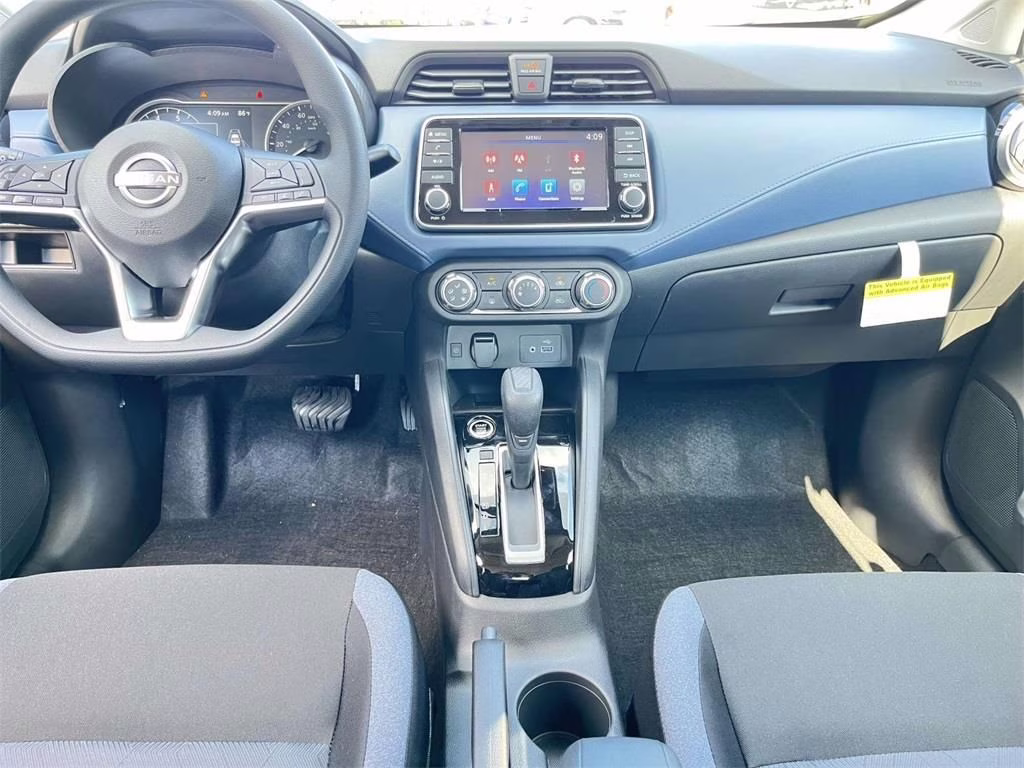 2025 Aspen White Tricoat Nissan Versa 1.6 SV FWD Sedan