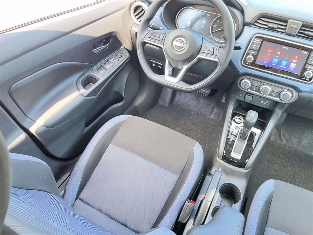 2025 Aspen White Tricoat Nissan Versa 1.6 SV FWD Sedan