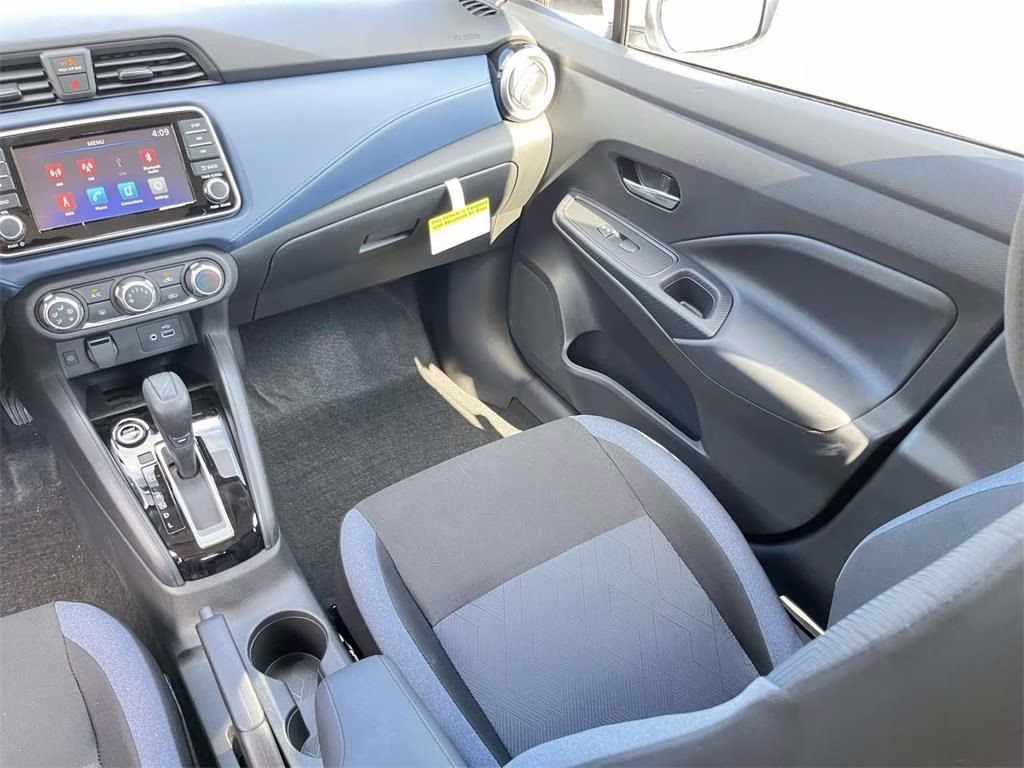 2025 Aspen White Tricoat Nissan Versa 1.6 SV FWD Sedan