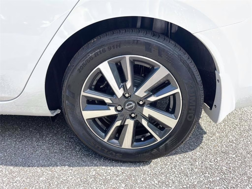 2025 Aspen White Tricoat Nissan Versa 1.6 SV FWD Sedan