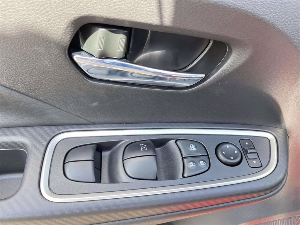 2025 Scarlet Ember Tintcoat Nissan Versa 1.6 SR FWD Sedan