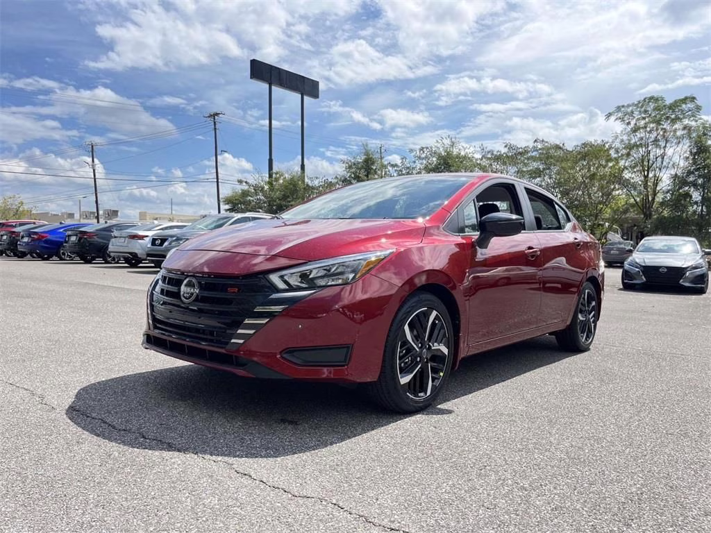 2025 Scarlet Ember Tintcoat Nissan Versa 1.6 SR FWD Sedan