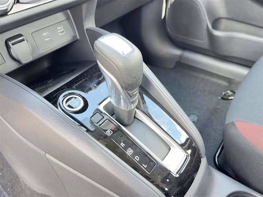 2025 Scarlet Ember Tintcoat Nissan Versa 1.6 SR FWD Sedan