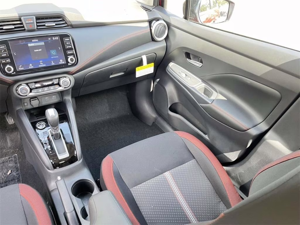 2025 Scarlet Ember Tintcoat Nissan Versa 1.6 SR FWD Sedan