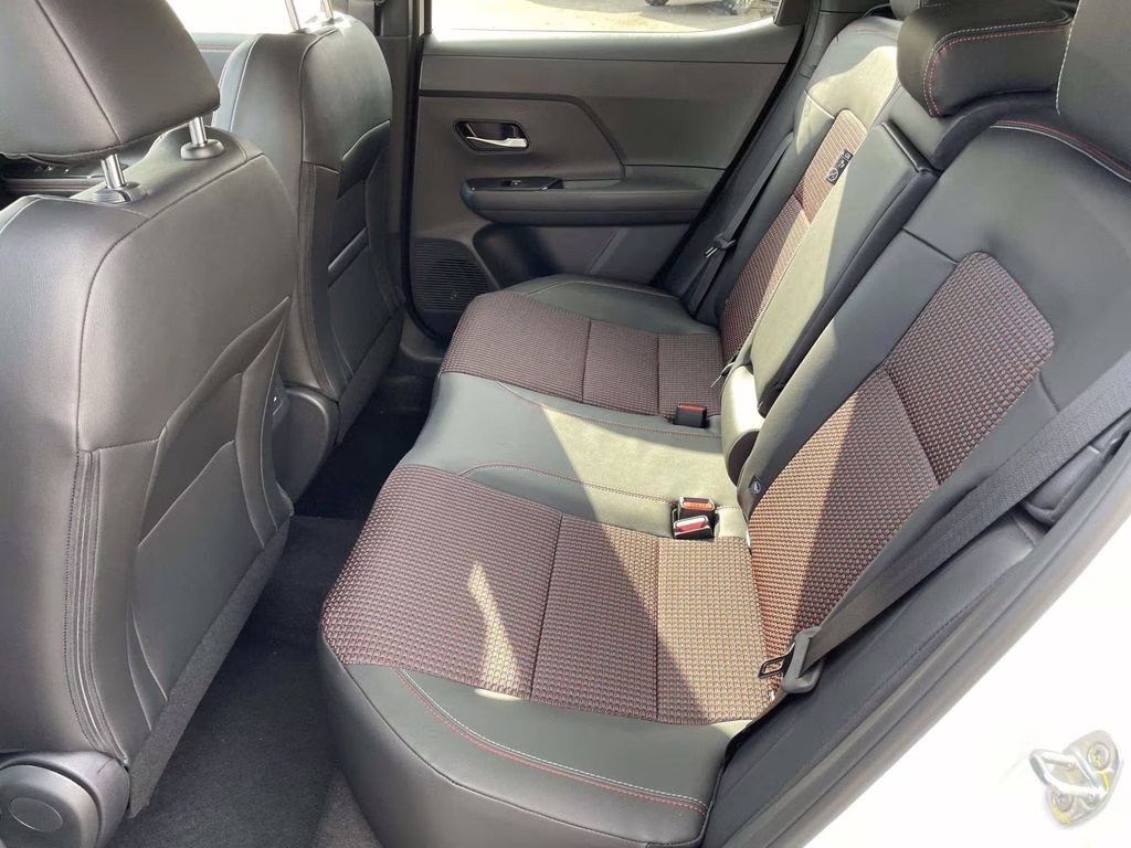 2026 Aspen White/Super Black Nissan Kicks SR FWD SUV