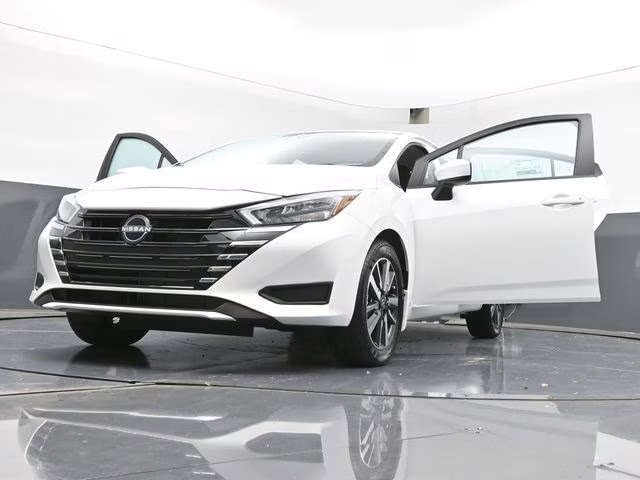 2025 Aspen White Tricoat Nissan Versa 1.6 SV FWD Sedan