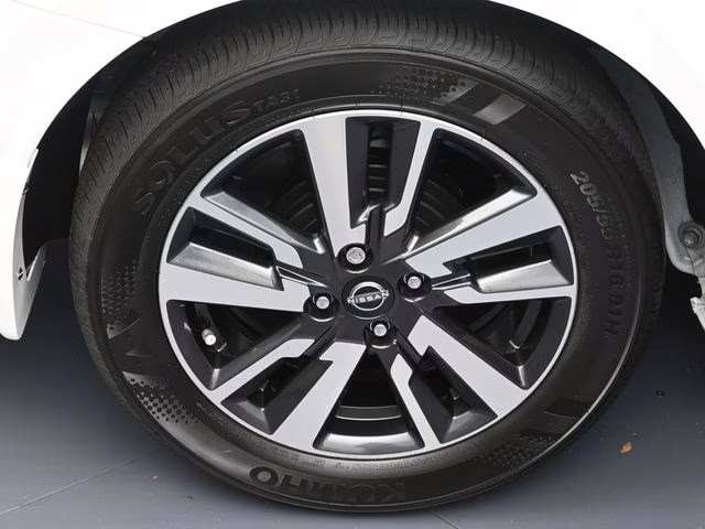 2025 Aspen White Tricoat Nissan Versa 1.6 SV FWD Sedan