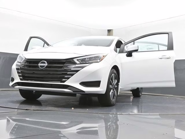 2025 Aspen White Tricoat Nissan Versa 1.6 SV FWD Sedan