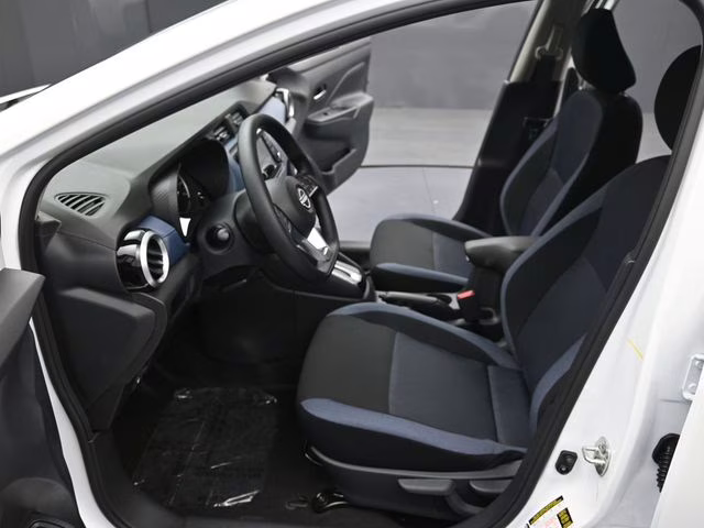 2025 Aspen White Tricoat Nissan Versa 1.6 SV FWD Sedan