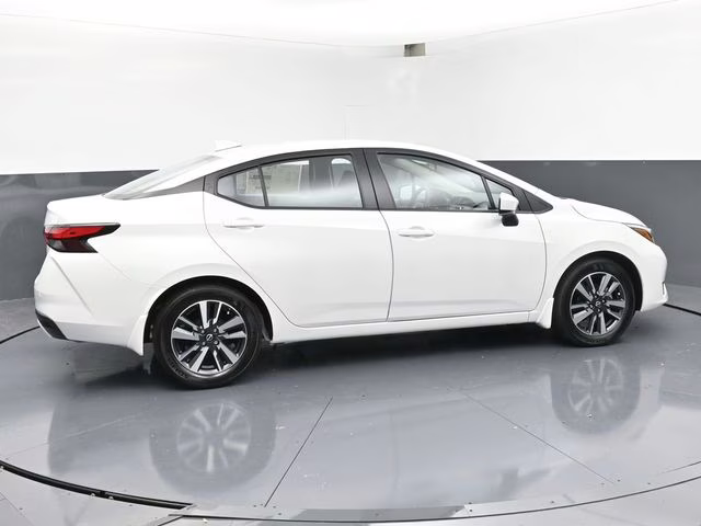 2025 Aspen White Tricoat Nissan Versa 1.6 SV FWD Sedan
