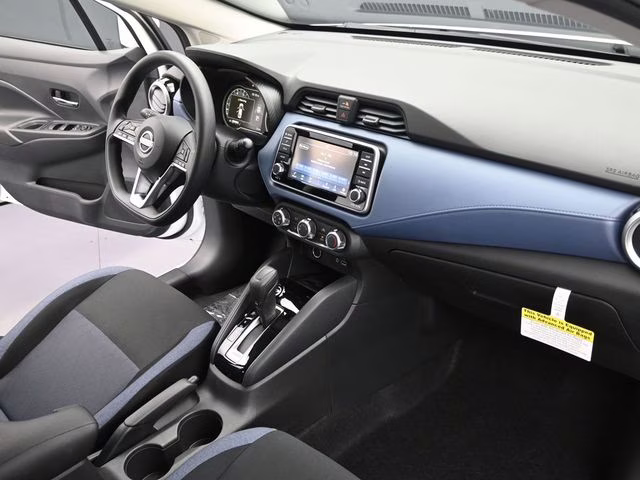 2025 Aspen White Tricoat Nissan Versa 1.6 SV FWD Sedan