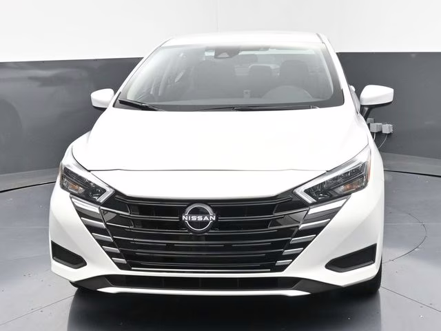 2025 Aspen White Tricoat Nissan Versa 1.6 SV FWD Sedan