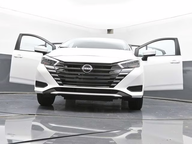 2025 Aspen White Tricoat Nissan Versa 1.6 SV FWD Sedan