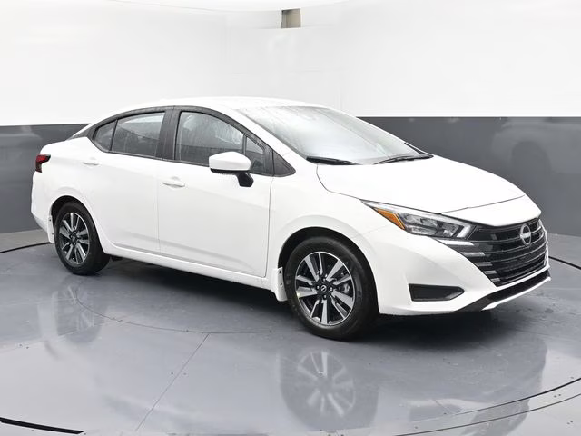 2025 Aspen White Tricoat Nissan Versa 1.6 SV FWD Sedan