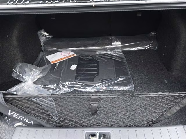 2025 Aspen White Tricoat Nissan Versa 1.6 SV FWD Sedan