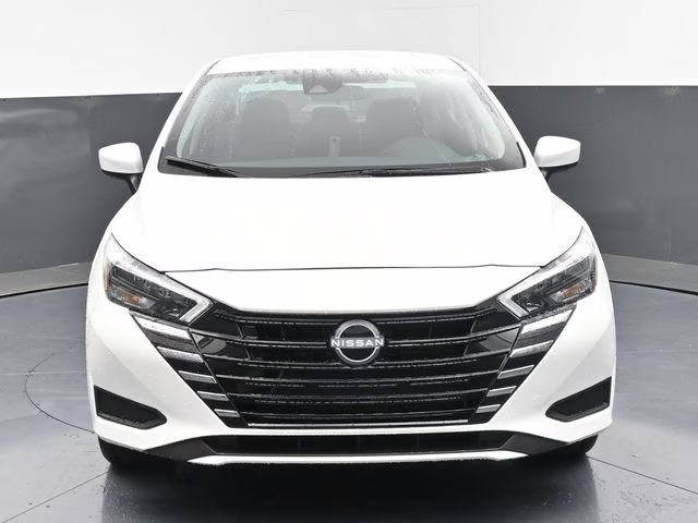 2025 Aspen White Tricoat Nissan Versa 1.6 SV FWD Sedan