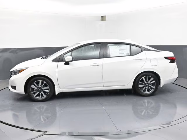 2025 Aspen White Tricoat Nissan Versa 1.6 SV FWD Sedan