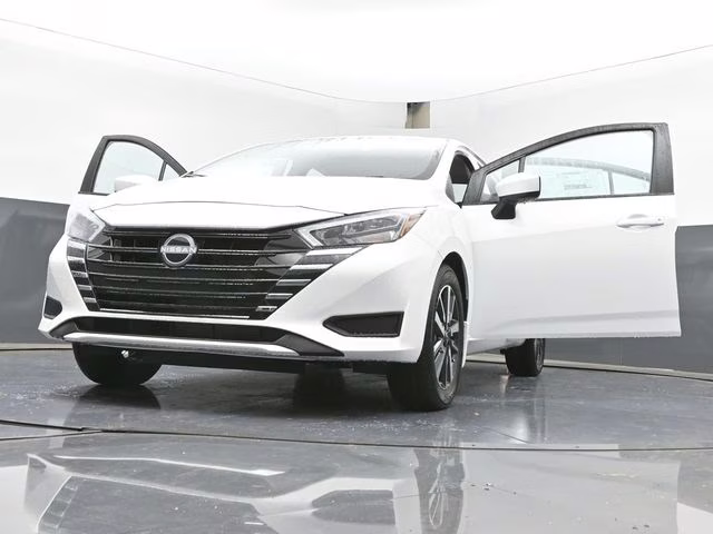2025 Aspen White Tricoat Nissan Versa 1.6 SV FWD Sedan