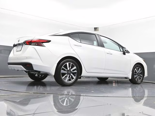 2025 Aspen White Tricoat Nissan Versa 1.6 SV FWD Sedan