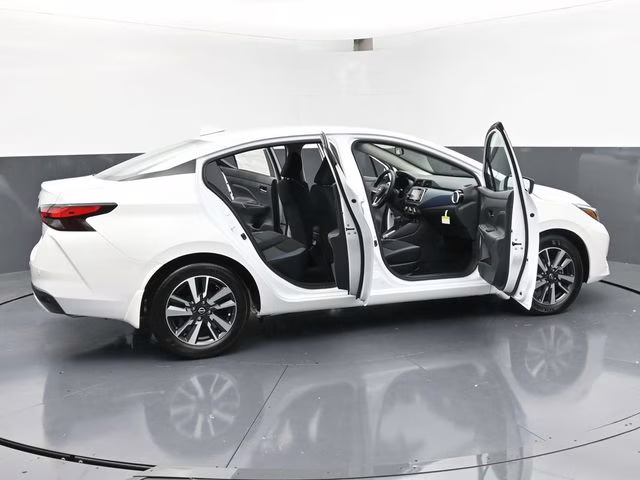 2025 Aspen White Tricoat Nissan Versa 1.6 SV FWD Sedan