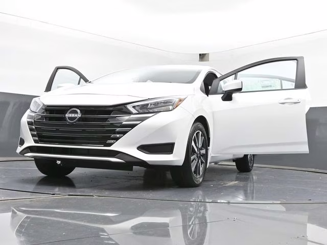 2025 Aspen White Tricoat Nissan Versa 1.6 SV FWD Sedan